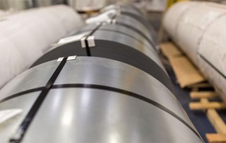 A close shot of a collection of steel coils in one of National Material’s steel processing facilities.