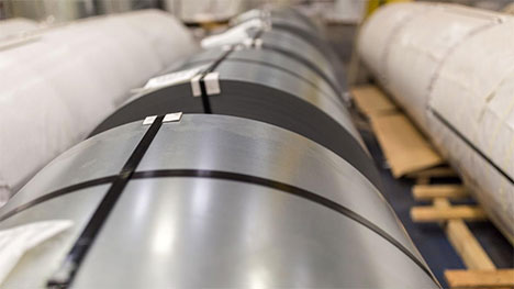A close shot of a collection of steel coils in one of National Material’s steel processing facilities.