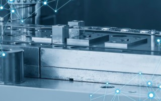 A close-up of a metal stamping machine, with a digital network motif suggesting industrial connectivity. Chosen to underscore the role of metal stamping in American manufacturing and its integration with modern production technologies.